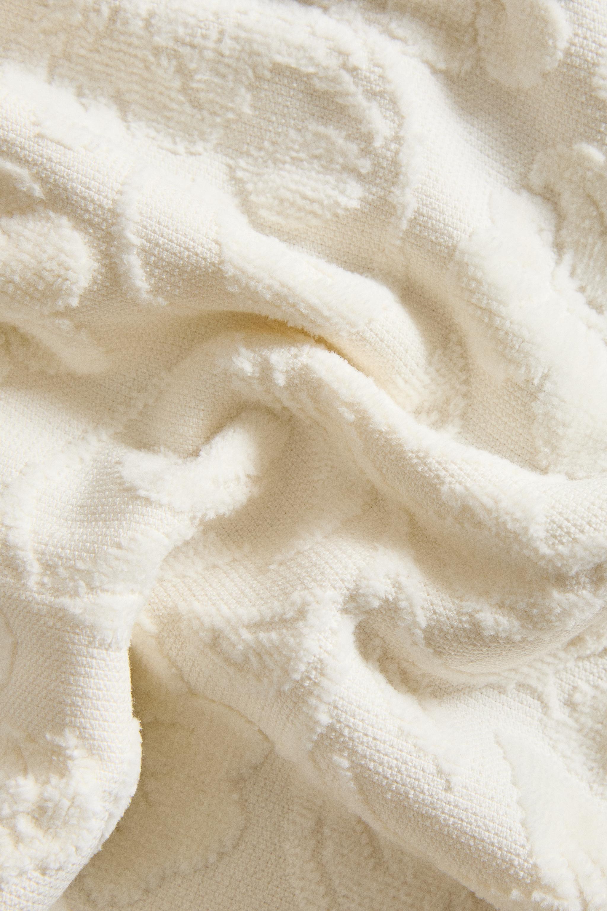 SERVIETTE DE BAIN JACQUARD FLEURS